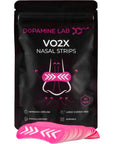 A black stand-up pouch of Dopamine Lab VO2X Nasal Strips with a stack of bright pink nasal strips displayed in front on a white background.